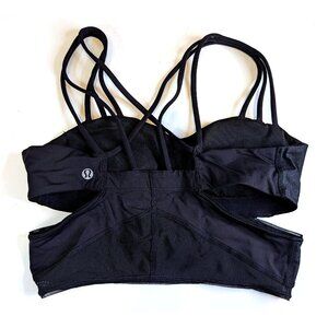 Black strappy Lululemon bra top with cutaway sides Size 6.